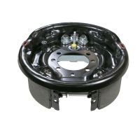 Bromssats med ankarplatta till vänster