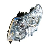 Strålkastare till vänster med servomotor