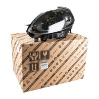 vänster strålkastare