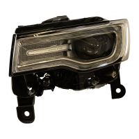 Främre vänster strålkastare