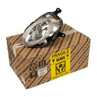 Strålkastare fram vänster under