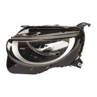 vänster strålkastare