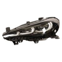 Främre vänster strålkastare