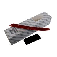 Röd reflex i vänster stötfångare