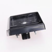 Nummerskyltsbelysning på vänster flak