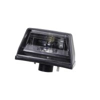 Nummerskyltsbelysning till vänster