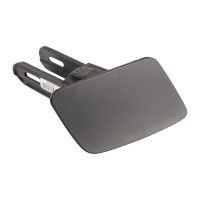 Täcklock på höger strålkastarspolares stötfångare