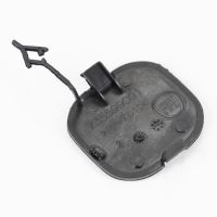 Täcklock på bakre stötfångaren i mitten