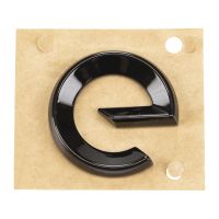 Bakre emblem bokstäver e